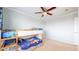 Bedroom with bunk beds, a ceiling fan, and a dresser at 3717 Desert Ridge Cir, Castle Rock, CO 80108