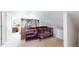 Cozy Bedroom space featuring a dark wood crib and changing table, perfect for a growing Gathering at 3717 Desert Ridge Cir, Castle Rock, CO 80108