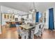 Dining area with a view into the spacious, open kitchen at 3438 Cade Ct, Castle Rock, CO 80104