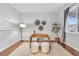 Bright office space featuring hardwood floors, modern decor, natural light, and neutral walls at 3438 Cade Ct, Castle Rock, CO 80104