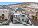 Aerial view of back of home featuring a deck with stairs and a landscaped yard at 3438 Cade Ct, Castle Rock, CO 80104