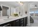 Modern bathroom with double vanity and quartz countertop at 2584 Meadows Blvd # E, Castle Rock, CO 80109