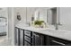 Modern bathroom with double vanity and dark brown cabinets at 2584 Meadows Blvd # E, Castle Rock, CO 80109