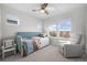 Bedroom with daybed, recliner, and large windows at 2584 Meadows Blvd # E, Castle Rock, CO 80109