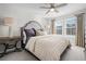 Spacious bedroom with large bed, ceiling fan, and plenty of natural light at 2584 Meadows Blvd # E, Castle Rock, CO 80109