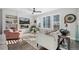 Cozy living room with fireplace and built-in shelving at 2584 Meadows Blvd # E, Castle Rock, CO 80109