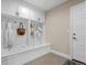 White built-in mudroom with storage and bench at 2584 Meadows Blvd # E, Castle Rock, CO 80109