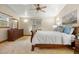 Inviting bedroom featuring a wooden bed frame, dresser, and relaxing decor at 205 Beech St, Hudson, CO 80642