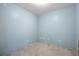 Bedroom with blue walls and carpeted floors at 205 Beech St, Hudson, CO 80642