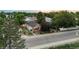 Charming single-story home with inviting front porch and well-maintained landscaping at 205 Beech St, Hudson, CO 80642