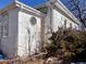 Side view of the house showing exterior siding at 4001 S Bannock St, Englewood, CO 80110