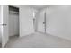 Spacious bedroom offering ample closet space and neutral-colored carpet at 6839 E 21St Ave, Denver, CO 80207
