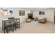 Spacious basement features seating and fireplace, perfect for entertainment at 10121 W 70Th Dr, Arvada, CO 80004