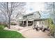 Spacious backyard featuring a patio with seating and a firepit at 15946 W Ellsworth Ln, Golden, CO 80401