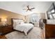 Serene main bedroom with plush carpeting, large windows, and a comfortable sitting area at 15946 W Ellsworth Ln, Golden, CO 80401