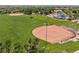 Aerial view of well-maintained baseball fields with green grass and open space, great for recreational activities at 837 E 98Th Ave # 405, Thornton, CO 80229