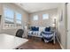 Cozy bedroom featuring a daybed with blue accents and natural light from two windows at 837 E 98Th Ave # 405, Thornton, CO 80229