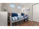 Cozy bedroom featuring a daybed with blue accents and natural light from two windows at 837 E 98Th Ave # 405, Thornton, CO 80229