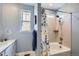 Bright bathroom with a shower-tub combination and a modern vanity at 1832 Marlowe Cir, Erie, CO 80516