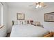 Well-lit bedroom features a comfortable bed and pillows at 800 Highway 72, Golden, CO 80403