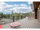 Relaxing deck space with comfortable seating and scenic views of the surrounding mountain forest at 800 Highway 72, Golden, CO 80403