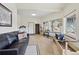 Spacious in home gym with large windows providing natural light and views of the surrounding landscape at 800 Highway 72, Golden, CO 80403
