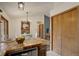 Kitchen featuring a tiled countertop and stainless steel dishwasher at 31150 Manitoba Dr, Evergreen, CO 80439