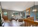 Bright living room with stylish decor, wood floors, and a cozy fireplace at 31150 Manitoba Dr, Evergreen, CO 80439