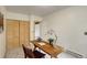 Well-lit office featuring storage and natural light at 31150 Manitoba Dr, Evergreen, CO 80439