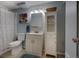 Charming bathroom with a classic vanity and a well-lit mirror for added functionality at 10373 W 75Th Ave, Arvada, CO 80005