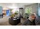 Bright living room features a comfortable sofa, stylish furniture, and an inviting atmosphere at 10373 W 75Th Ave, Arvada, CO 80005