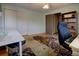 Office with large rug and lots of natural light, perfect for staying focused and productive at 10373 W 75Th Ave, Arvada, CO 80005