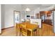 Open dining area near the kitchen, providing ample space for entertaining and Gathering gatherings at 1513 Cannon Mountain Dr, Longmont, CO 80503