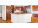 Well-equipped kitchen with stainless steel appliances, tile backsplash, and granite countertops at 1513 Cannon Mountain Dr, Longmont, CO 80503