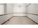 Spacious, carpeted room with base molding and large window, perfect for relaxing or entertaining guests at 1513 Cannon Mountain Dr, Longmont, CO 80503