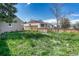 Backyard with grassy area featuring a wooden fence at 7301 Dale Ct, Westminster, CO 80030