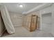 Unfinished basement with drywall, carpet, and decor at 7301 Dale Ct, Westminster, CO 80030