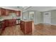 Updated kitchen features stylish cabinets, granite countertops, and stainless steel appliances at 7301 Dale Ct, Westminster, CO 80030