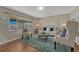 Comfortable living room with large window, hardwood floors, and stylish decor at 7301 Dale Ct, Westminster, CO 80030