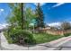 Corner lot featuring a well-maintained lawn, tidy landscaping, and a charming fenced yard at 7301 Dale Ct, Westminster, CO 80030