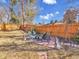 Secluded backyard fire pit area with seating, offering a cozy outdoor space at 6721 S Clayton Way, Centennial, CO 80122