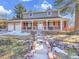 Beautiful two-story home with a charming front porch and a two-car attached garage at 6721 S Clayton Way, Centennial, CO 80122