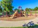 Colorful playground with slides and climbing structures, offering a safe and fun environment for children to play at 6721 S Clayton Way, Centennial, CO 80122