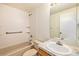 Clean bathroom with tub, toilet and vanity at 3912 S Atchison Way # E, Aurora, CO 80014