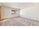 Bright bedroom with carpet and window view at 3912 S Atchison Way # E, Aurora, CO 80014