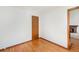 Spacious bedroom with hardwood floors and access to other rooms at 3912 S Atchison Way # E, Aurora, CO 80014