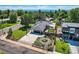 Beautiful home featuring a landscaped yard, a pergola-covered patio, and a modern design at 3695 E Dartmouth Ave, Denver, CO 80210