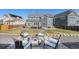 Backyard patio with fire pit and comfortable seating, perfect for outdoor relaxation and entertaining at 4073 S Liverpool St, Aurora, CO 80013