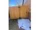 Wooden gate providing access to backyard at 1120 Tucson St, Aurora, CO 80011