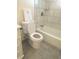 Bathroom with tile surround on walls and modern fixtures at 1120 Tucson St, Aurora, CO 80011